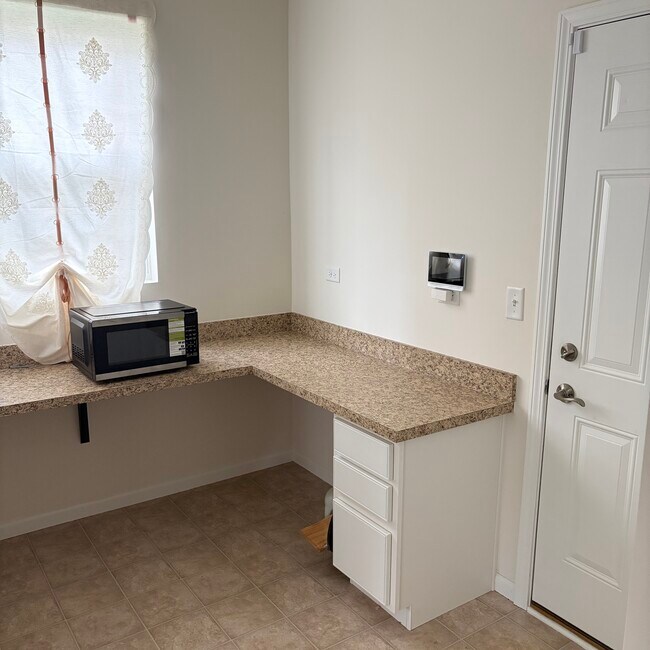 Foto del edificio - 12414 S Compass Ave