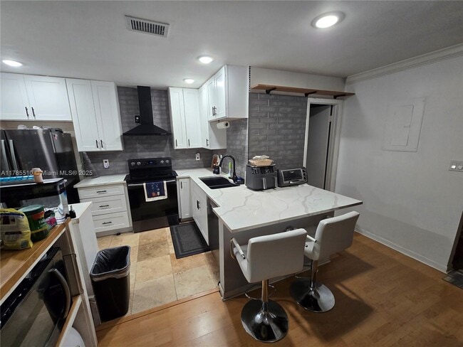 Foto del edificio - 605 NW 47th St