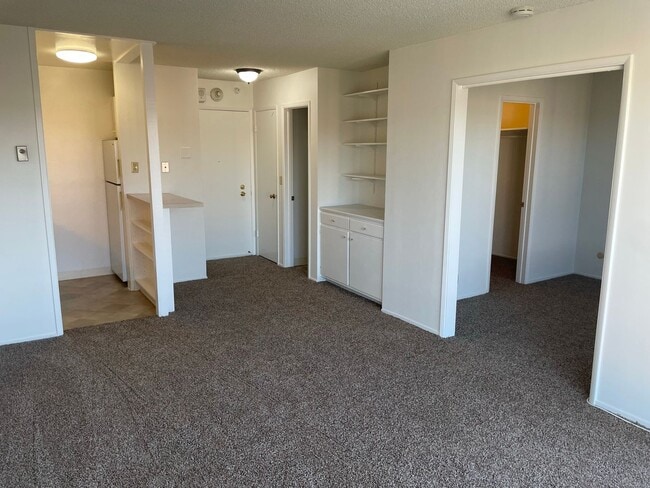 Building Photo - TOP FLOOR UNIT!!! Studio Condo Available i...
