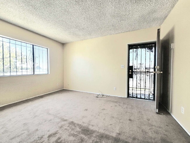 Building Photo - Welcome home to this charming and affordab...