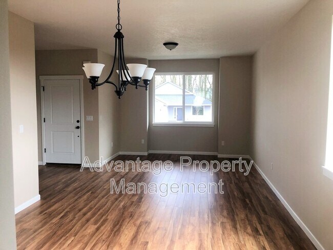 Building Photo - 5836 NE Chandra Ct