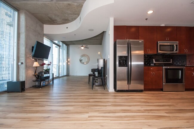 Building Photo - For Rent: Stunning 17th Floor Views of Dow...