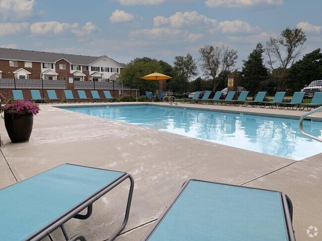 Soak up the sun or take a dipyour resort-style pool and sundeck make every day feel like a getaway. - Ridge Pointe Villas