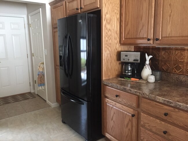 Enter through garage or the door across from the refrigerator - 121 Touchstone Dr