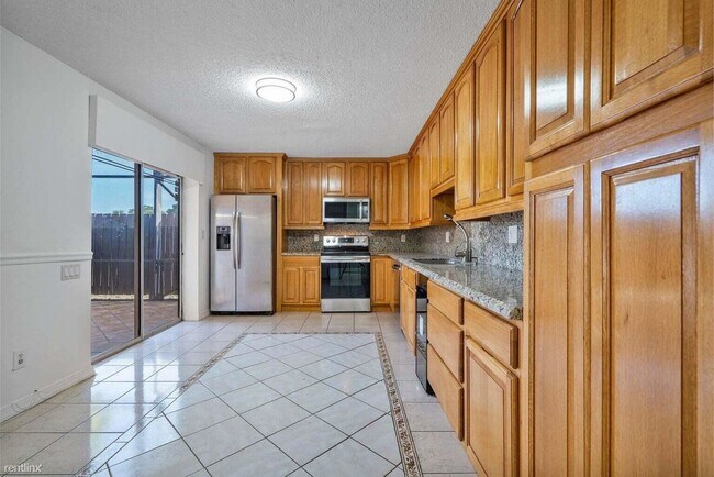 Building Photo - 3 br, 2.5 bath Townhome - 8119 Boca Rio Dr
