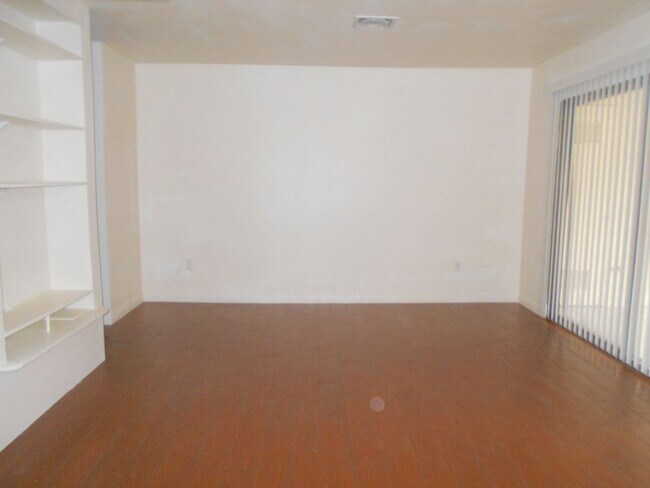 Building Photo - Inviting Home Situated in a Gated Community!