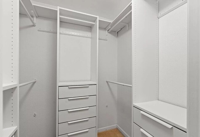 Building Photo - Executive-Style Unit Available Now