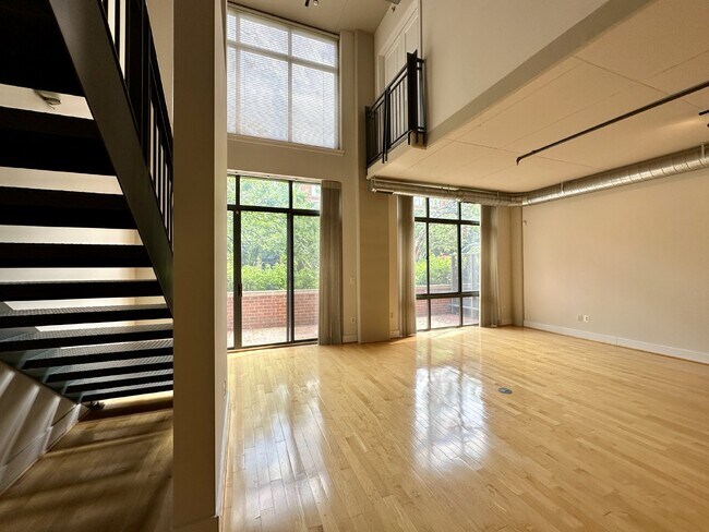 Building Photo - Spacious Loft-Style Condo with Two-Level L...