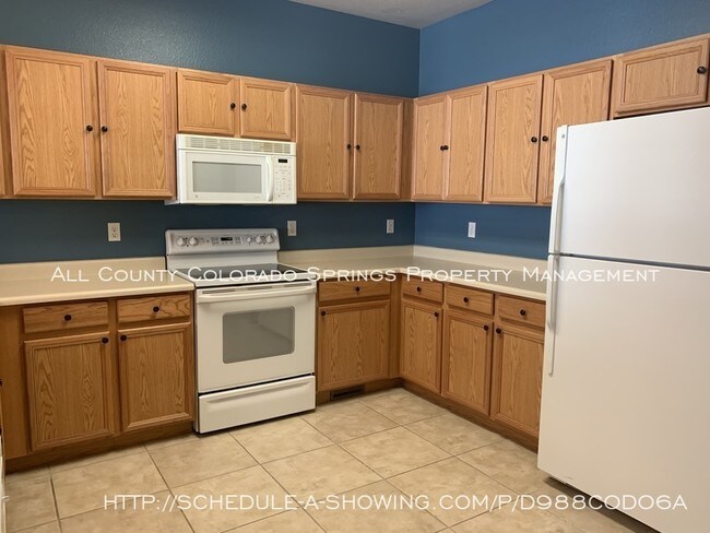 Building Photo - 5946 Ensemble Heights