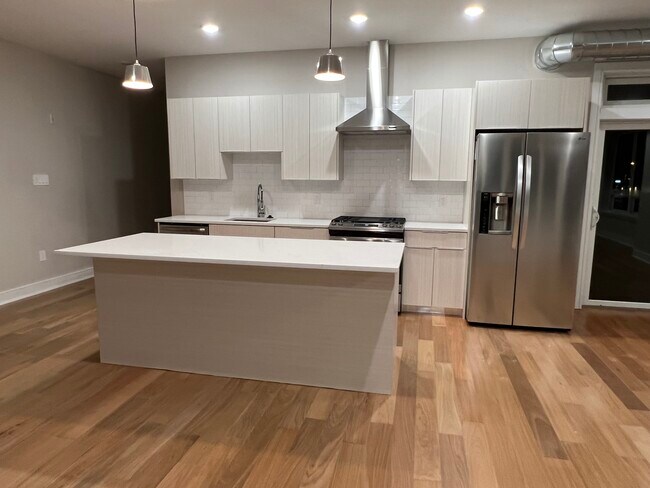 Gas stove with vent hood with light. Deep sink with spray. - 3202 Capri Dr