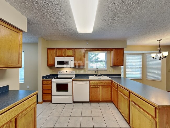 Building Photo - 7908 Windrift Pl