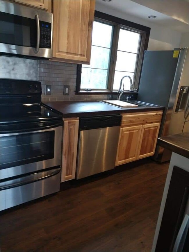 Building Photo - 6212 Tennis Ct
