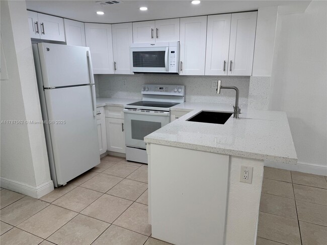 Building Photo - 8695 NW 6th Ln