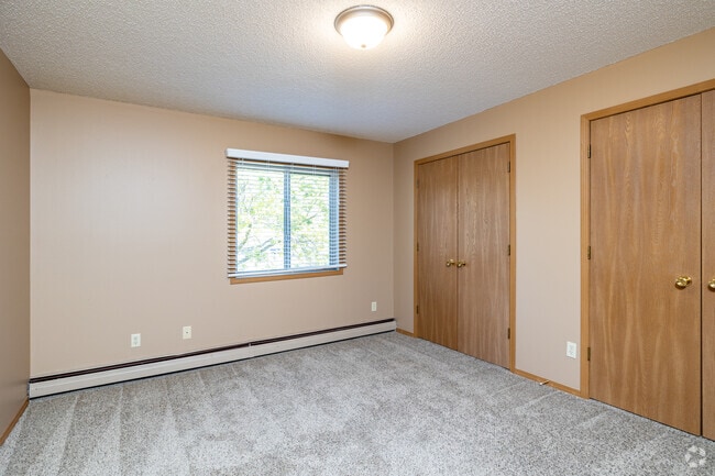2BR, 1BA - 1,030SF - Primary Bedroom - Chapelwood III Apartments