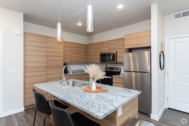 2 habitaciones, 2 baños - 1026 pies cuadrados - Cocina - The Flats at Riverwoods