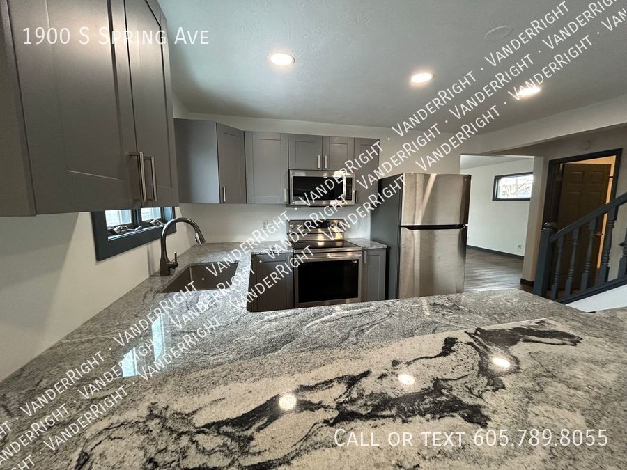 Primary Photo - Spacious 4 Bedroom House With Huge Garage!