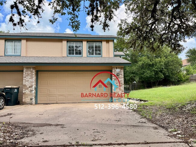 Building Photo - Available July 11: 3 bedroom, 2.5 Bath Duplex with Garage and Fenced Yard