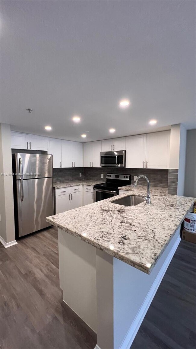 Building Photo - 218 NW 12th Ave