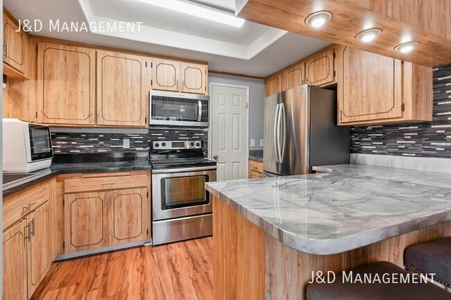 Foto del edificio - Spacious Home with Large Balcony and Parki...