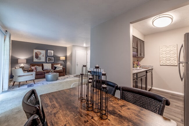 Living and Dining Room at Woodbridge Bloomington - Woodbridge of Bloomington