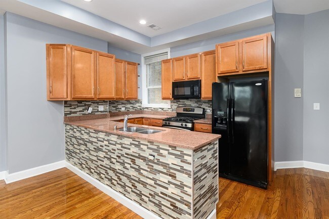 Foto del edificio - 3848 S Lake Park Ave