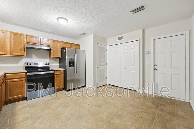 Building Photo - 8471 McGirts Village Ln