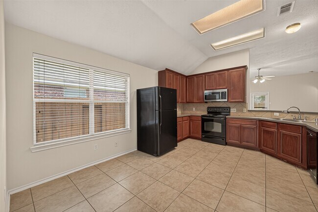 Foto del edificio - 5006 Juniper Walk Ln