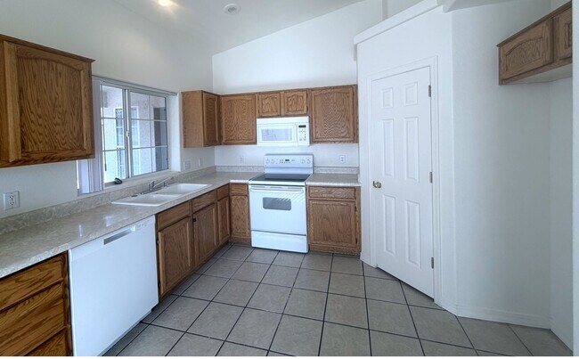 Building Photo - Corner Lot Living with a Covered Patio and Spacious Split Floor Plan