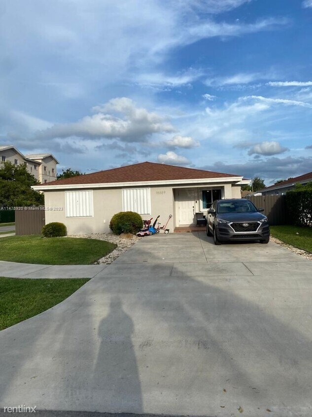 Foto principal - 4 br, 2 bath House - 18889 NW 35th Ave