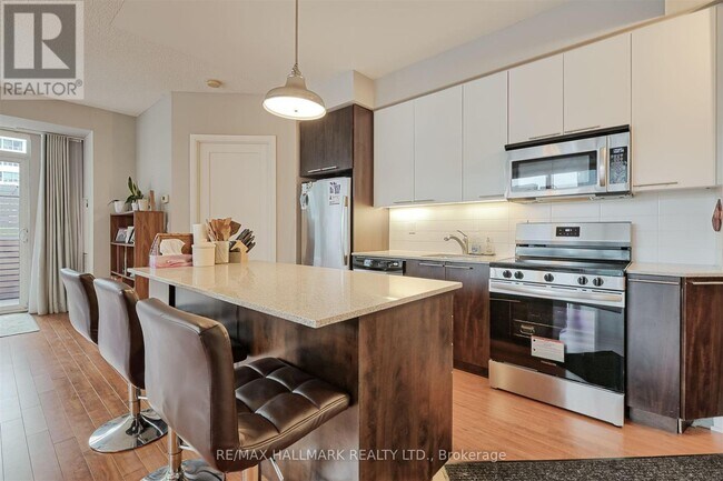 Photo du bâtiment - 25-625 Broadway Ave