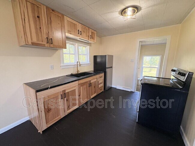 Foto del edificio - 6418 Huguenard Rd