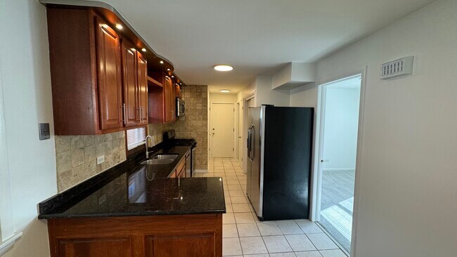 Foto del edificio - 5647 W Lawrence Ave