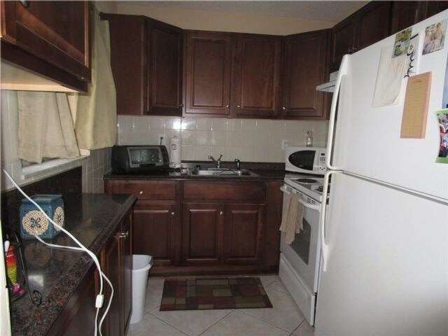 Building Photo - 2020 NE 51st Ct