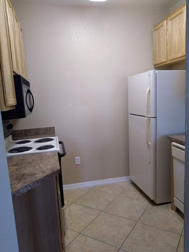 Foto del edificio - Beautiful one-bedroom condominium in the d...