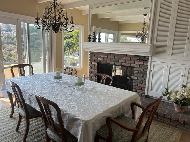 Formal dining room with storage, views , and fireplace - 27078 Sunnyridge Rd