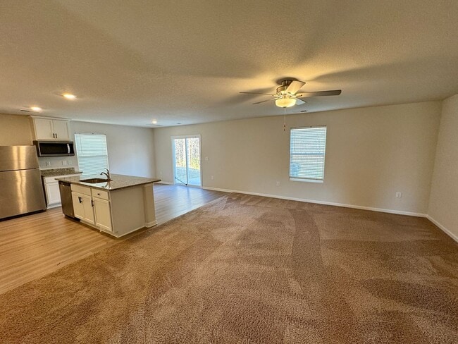 Photo - Located in Creedmore Hills a 4BR/2.5BA home with 2 car garage