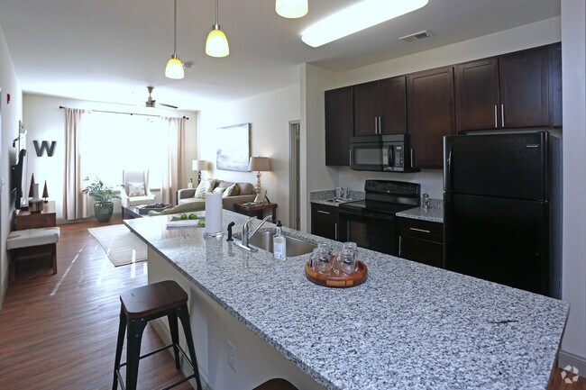 Granite 9ft Islands in all kitchens! - Watercourse