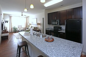 Granite 9ft Islands in all kitchens! - Watercourse