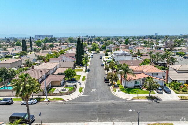 The palm-tree-lined streets of Arleta are filled with ranch and modern style homes.