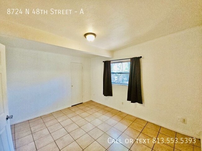 Photo - 8724 N 48th St Apartment