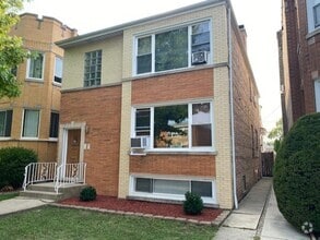 Building Photo - 5530 N Mango Ave