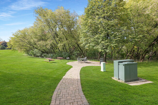 Exterior View - Patio Area - Applewoods Apartments