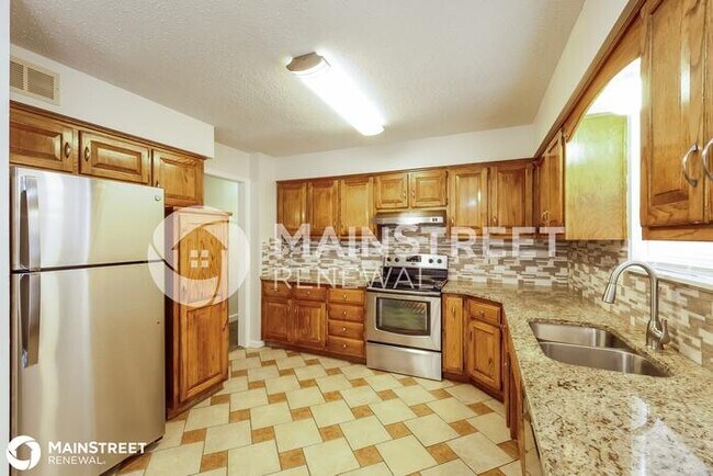 Building Photo - 825 HEATHER DR, BELTON, MO 64012