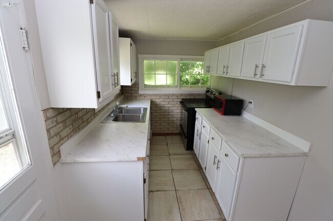 Foto del edificio - Charming Two Bedroom Unit in the Heart of ...