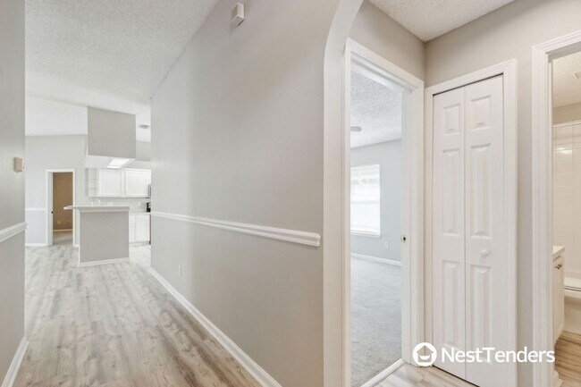Building Photo - Freshly Painted with New Flooring in Boomi...