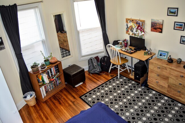 Bedrooms have lots of light and high ceilings - 1911 Asbury Ave