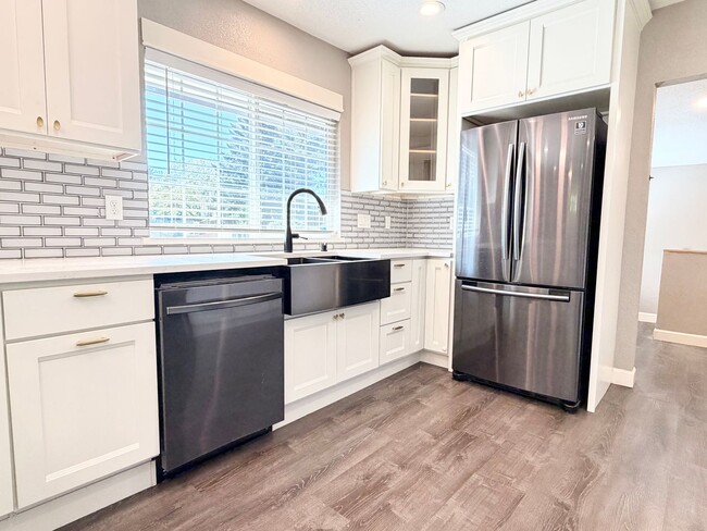 Building Photo - Lovingly Updated Home with Separate Garage, Outdoor Cat Enclosure, Finished Basement, Large Yard,...