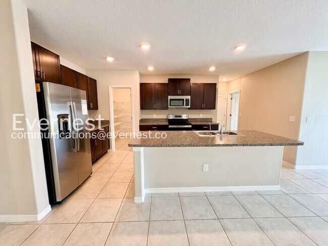 Foto del edificio - 7329 Canterbury Bells Ct