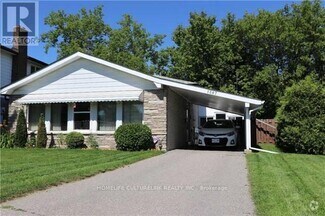 Building Photo - 1387 Sarcee St