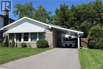Building Photo - 1387 Sarcee St